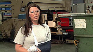 Screenshot of woman in a splint in the cell phone safety in the workplace training video