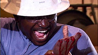 A graphic image of a worker who injured his hand in the forklift safety training video