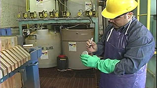 A man checking a hazardous generator