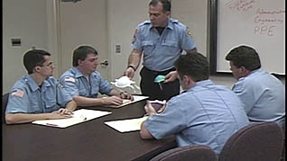 First responders having a meeting about how to handle Tuberculosis