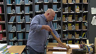 A man working on his desk