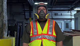 A man with proper PPE on