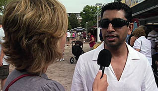 Man being interviewed for TV