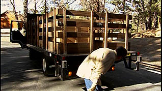 A driver checks his taillights during his pre-trip inspection