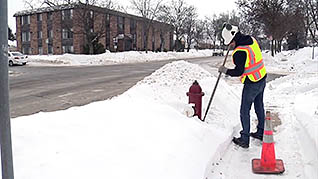 Working around a fire hydrant in the winter