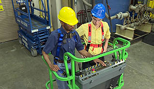 Two men working on a site