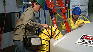 Woman working with a tube