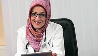 A doctor in her office