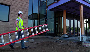 A man carrying a ladder