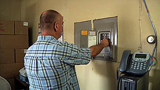 A man using a circuit board