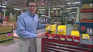A man showing a toolbox