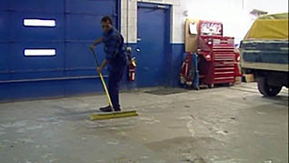 A man cleaning the floor