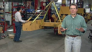 A man explaining the importance of overhead crane safety