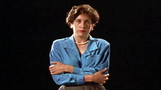 Screenshot of a nervous woman from the public speaking training video