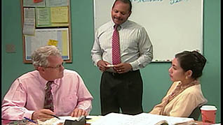 Three co-workers in a meeting