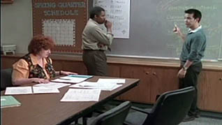 Three employees having a meeting