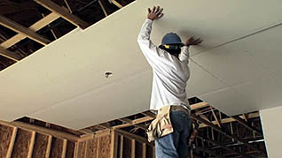 How to safely hang drywall overhead