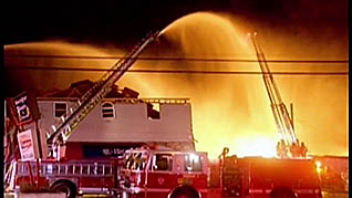 Firefighters putting out a fire