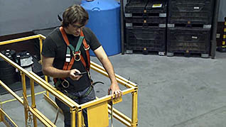 Screenshot of worker on cell phone in the cell phone safety in the workplace video