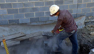 A man using proper respiratory protection