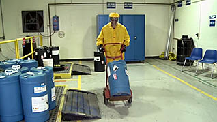 A man moving hazardous waste