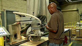 A man using a machine guard