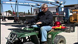 A man operating a ATV