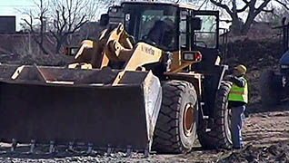 A man using a bulldozer