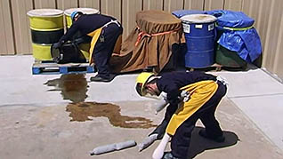 A man working on a hazardous leak