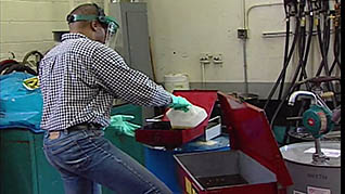 A man disposing of hazardous waste