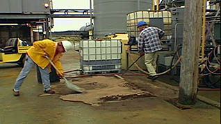 Two men responding to a spill