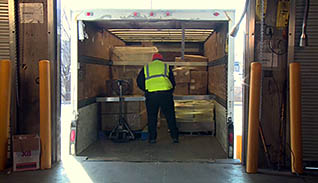 image of someone loading cargo into a truck