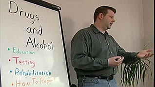 Man training employees about drugs and alcohol