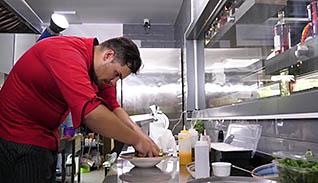 Man preparing food in a kitchen