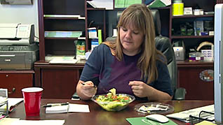 Woman eating a salad