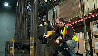 A man operating a forklift