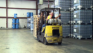 A man operating a forklift
