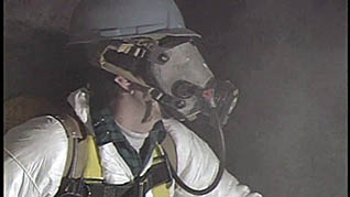 A man wearing the proper equipment for electrical safety