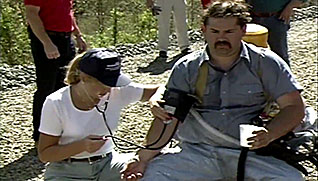 A man getting checked for heat stress