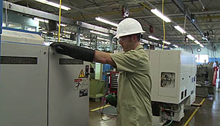 A man working on a electrical box