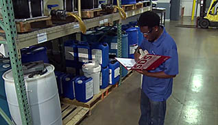 A man reading an SDS manual