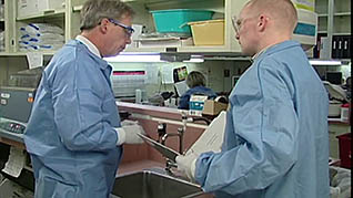 Two men working in a lab