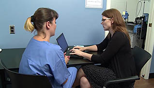 Two women talking together