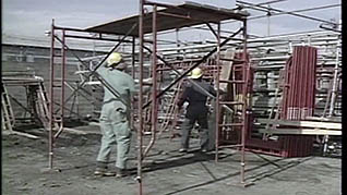 Men assembling a scaffold