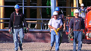 Men wearing the proper safety equipment