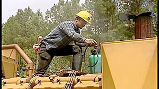 A man cleaning a machine