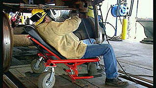 A man using back support while working