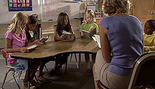 A women reading to children