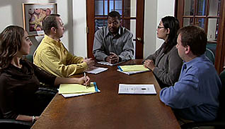 Workers having a meeting