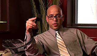 Man talking with phone in hand